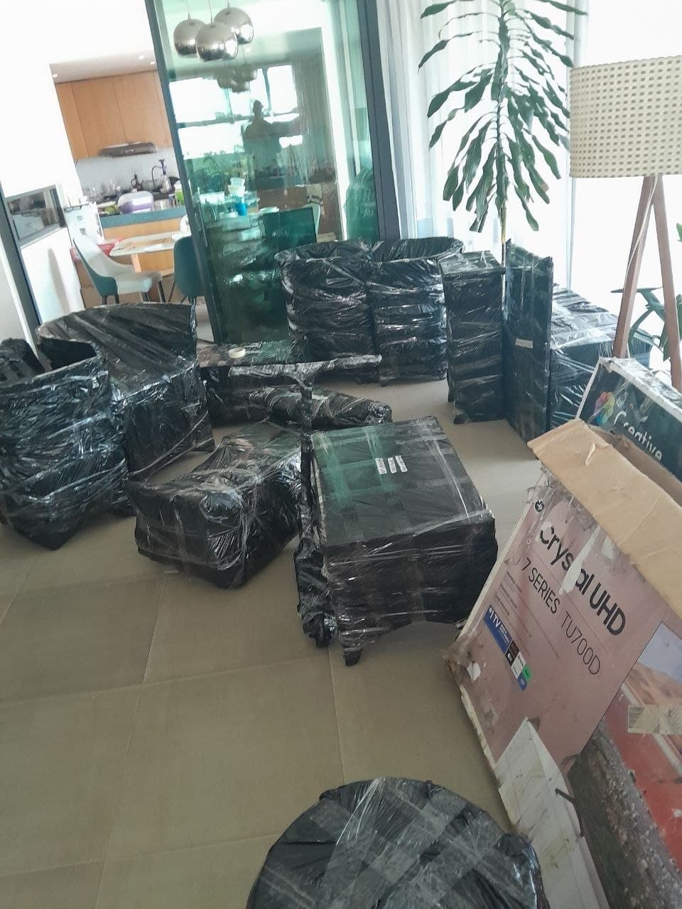 Furniture carefully wrapped with protective materials for safe transport